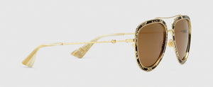 GOLD METAL AND LEATHER